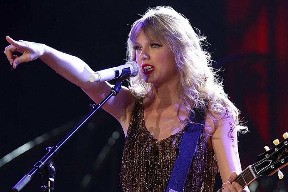 Win Taylor Swift’s Autographed Red Guitar