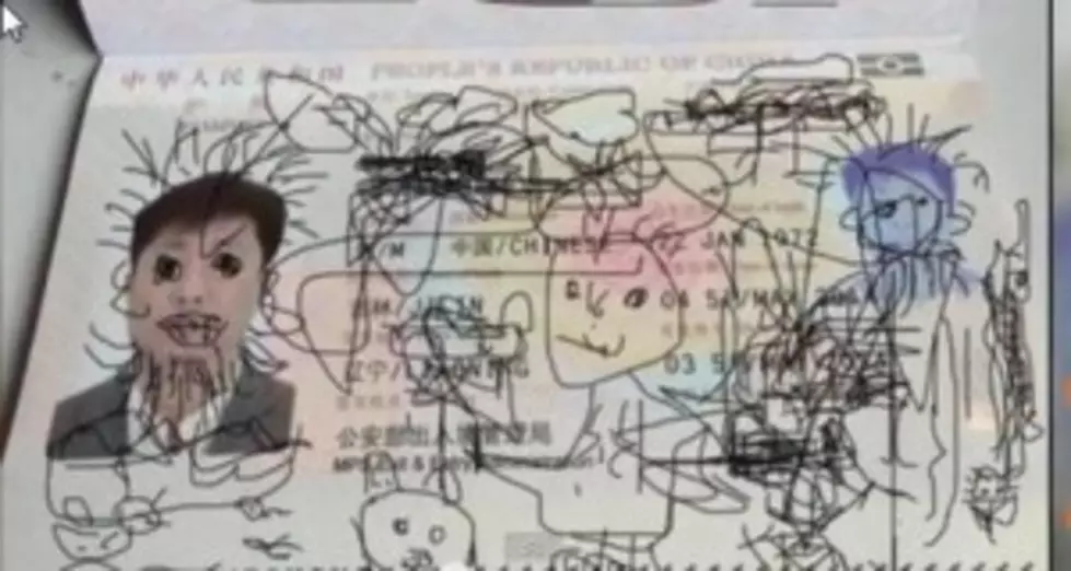 Four Year Old Uses Dad&#8217;s Passport As A Coloring Book