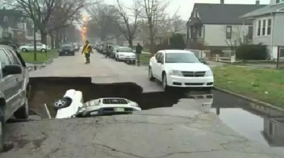 WATCH: Last Week&#8217;s Storms Cause Sinkholes In Chicago That Swallow Cars [VIDEO]