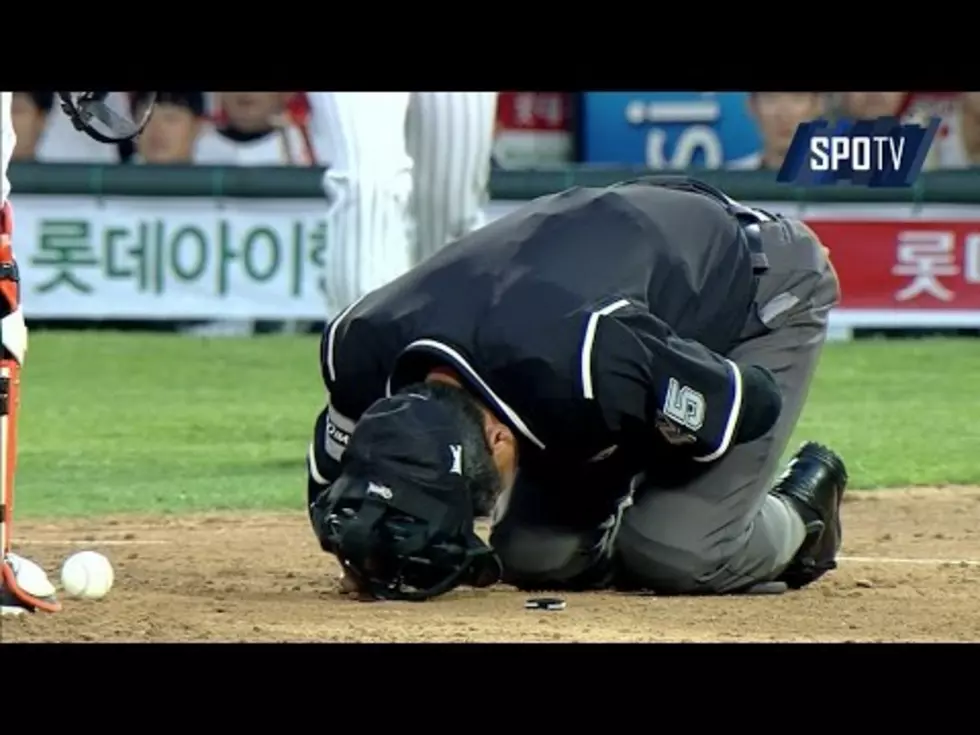 Korean Umpire Takes A Pitch To The Privates And Is Taken Off On A Stretcher [VIDEO]