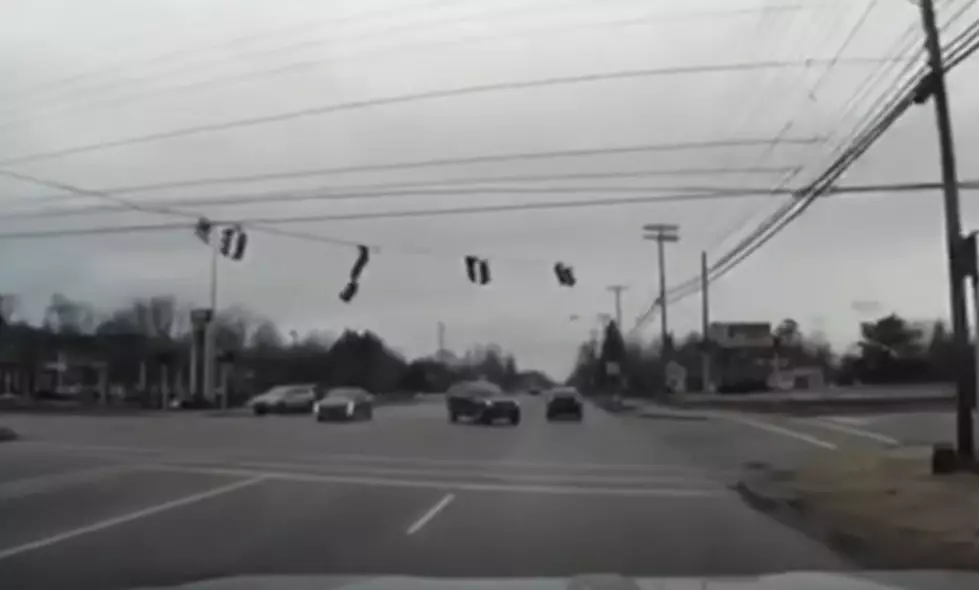 High Winds Blow Down Traffic Light [Video]
