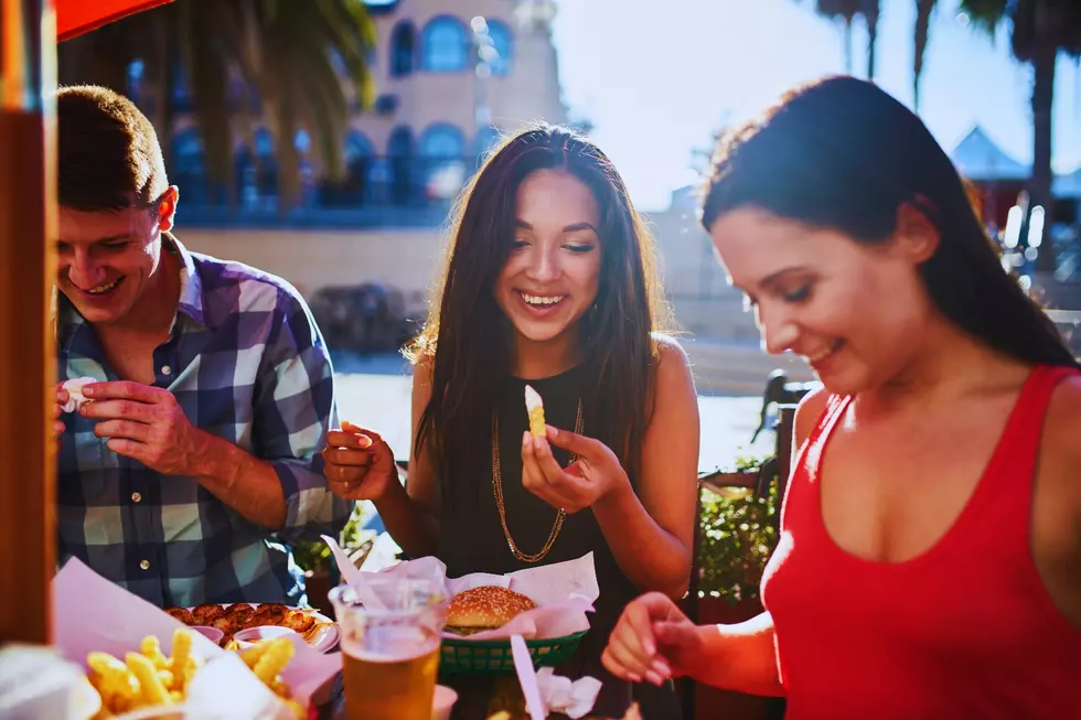People eating burgers