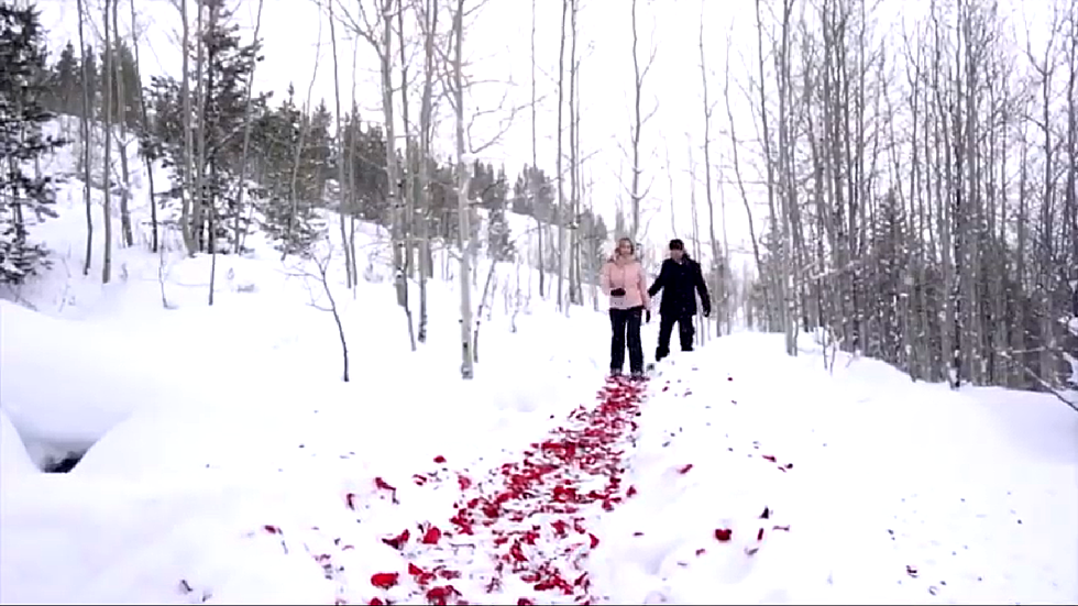 Jackson, Wyoming Dude Proposes by Lining a Snow Trail with Roses