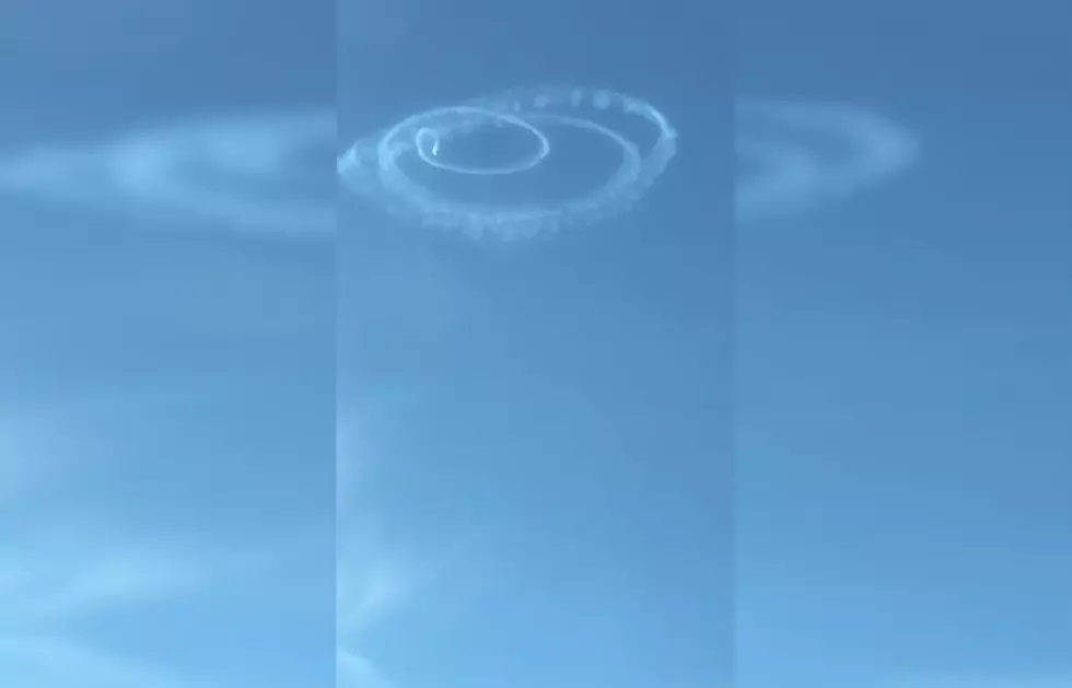 Watch Weird Object Make Smoke Rings in the Sky then Disappear
