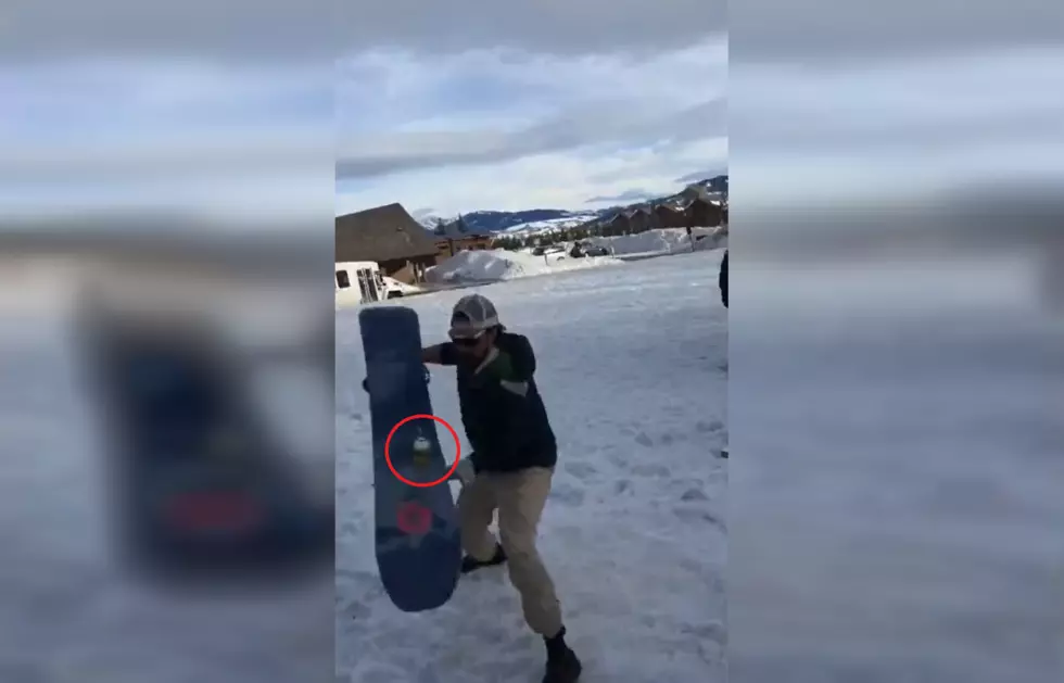 Wyoming Snowboarder Flings Beer to His Friend Who Drinks It