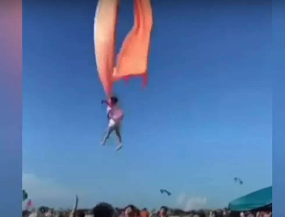 Watch: Toddler Caught In A Kite Flies Dangerously High In The Air
