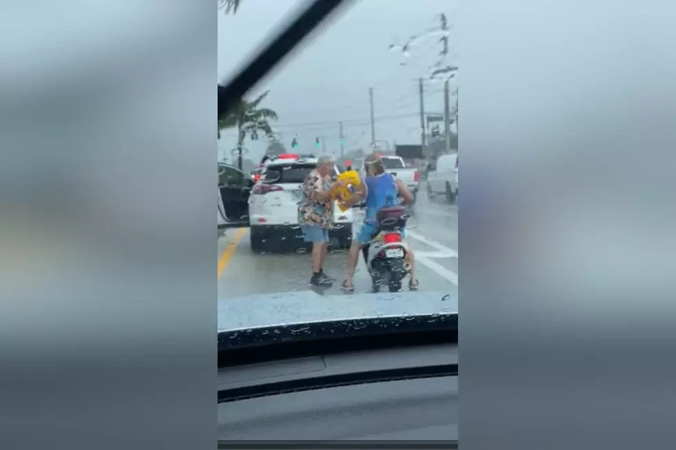 Watch a Sweet Elderly Lady Give a BIker Her Coat During a Storm