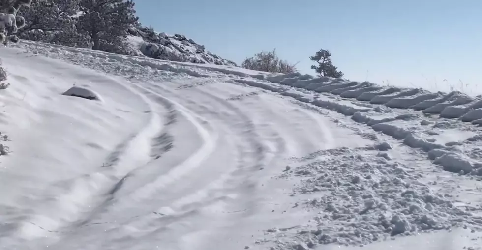 Heroic Wyoming Dude Shovels 200 Feet of Hill for Minivan