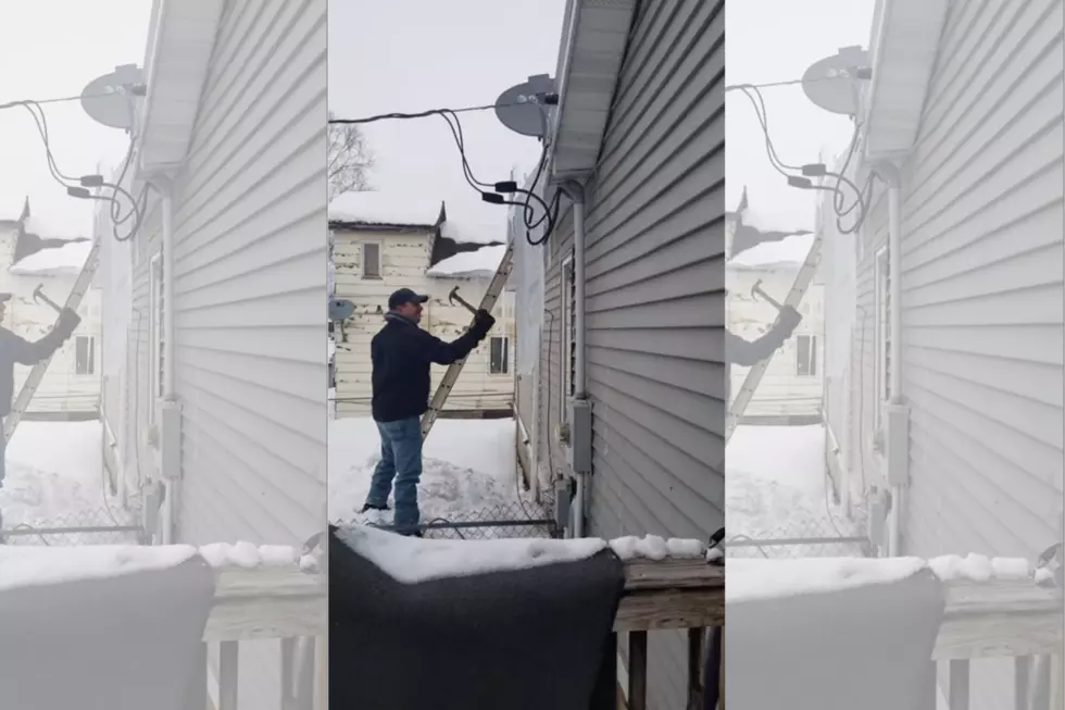 Watch This Guy Remove Ice From His House and Cause a Power Outage
