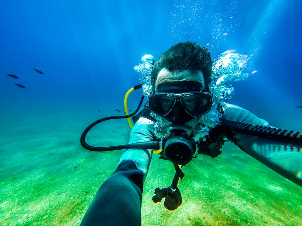 Underwater Treasure Hunter Explores Nimrod Hot Spring