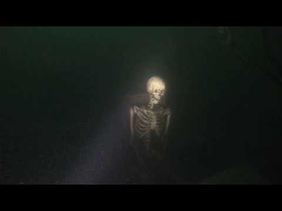 Scuba Divers Find 4 Skeletons Playing Poker on Bottom of a Lake