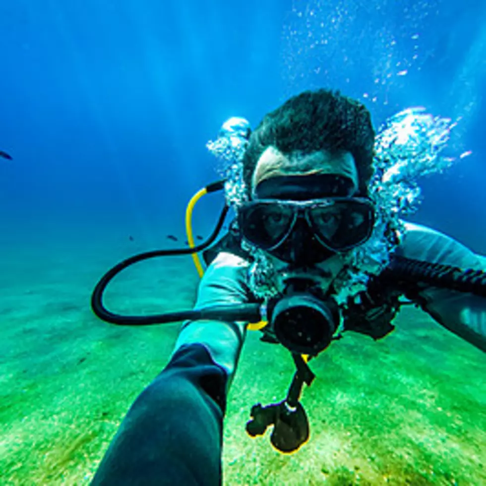 Underwater Treasure Hunter Explores Nimrod Hot Spring