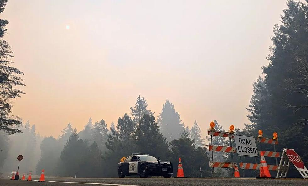 Firefighters pin hopes on weather while battling Smith River fire