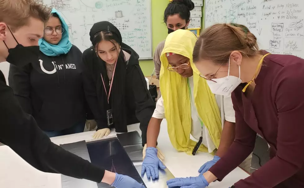 SLC building has cosmic ray detectors built by refugee teens