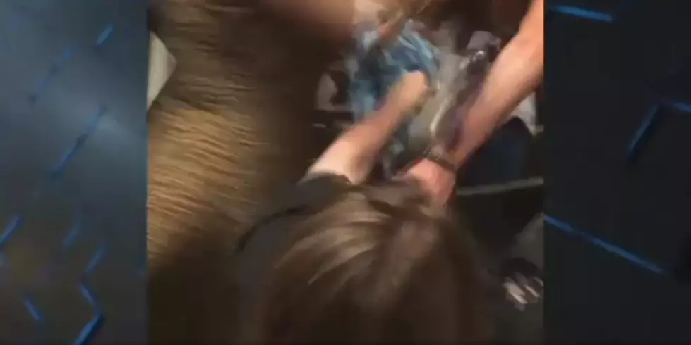 It’s A Girl Fight!  Two Women Fight Over Seats At Graduation In A Church! [Video]