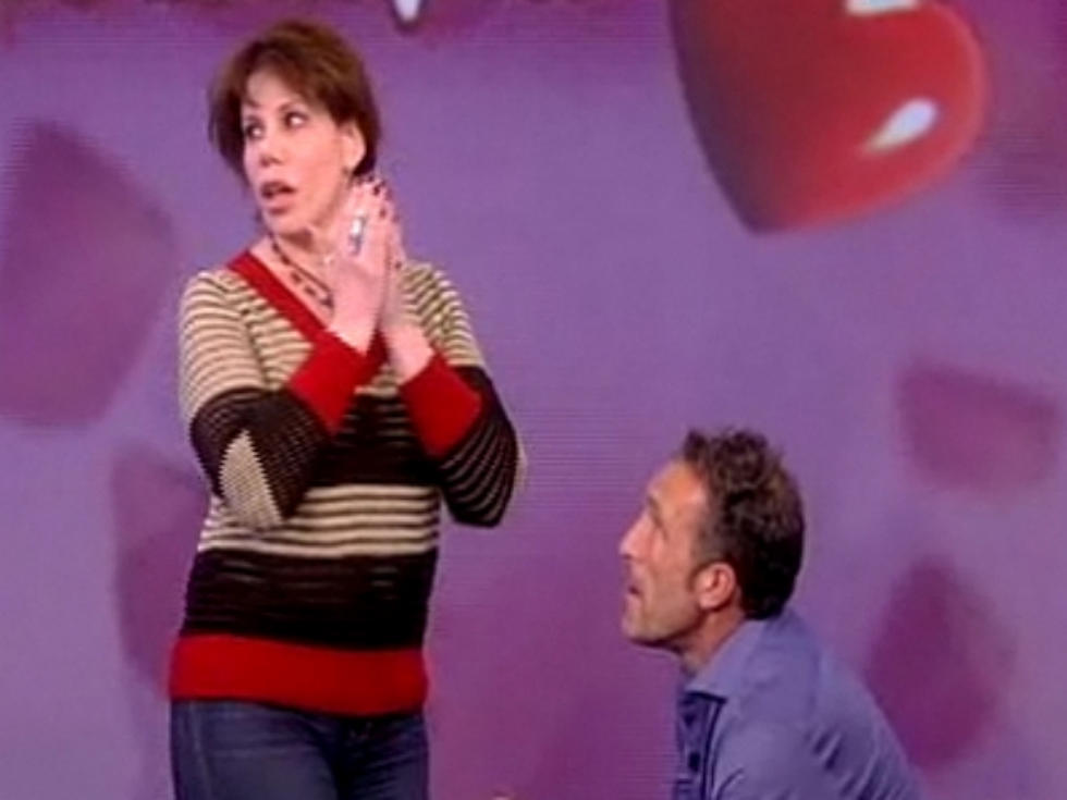 Woman Has Strange Reaction to Live Televised Wedding Proposal [VIDEO]
