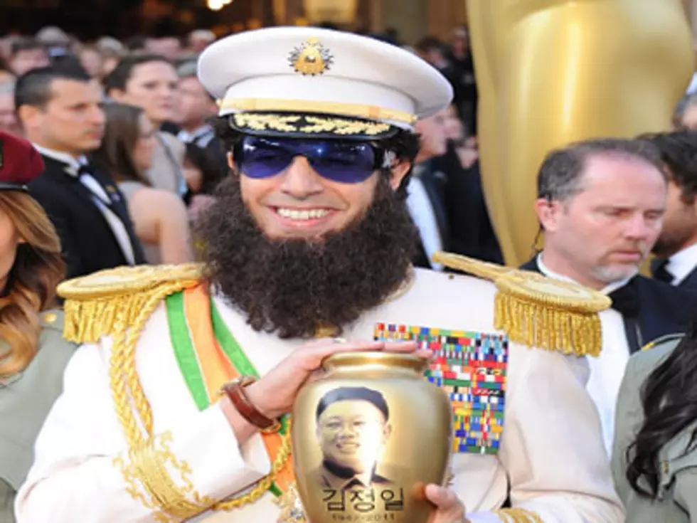 Sacha Baron Cohen Spills the Ashes of Kim Jong-Il on Ryan Seacrest at the Oscars