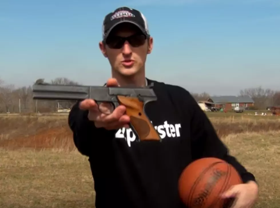 Trick Shooter Salutes March Madness With a 22 Pistol!