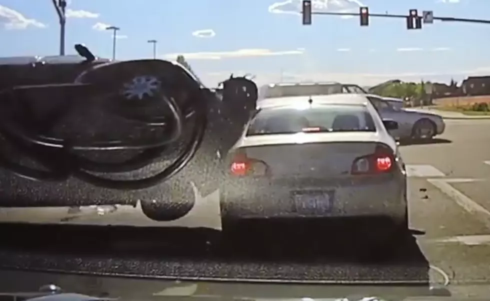 VIDEO: Pasco police officer narrowly escapes getting hit by car