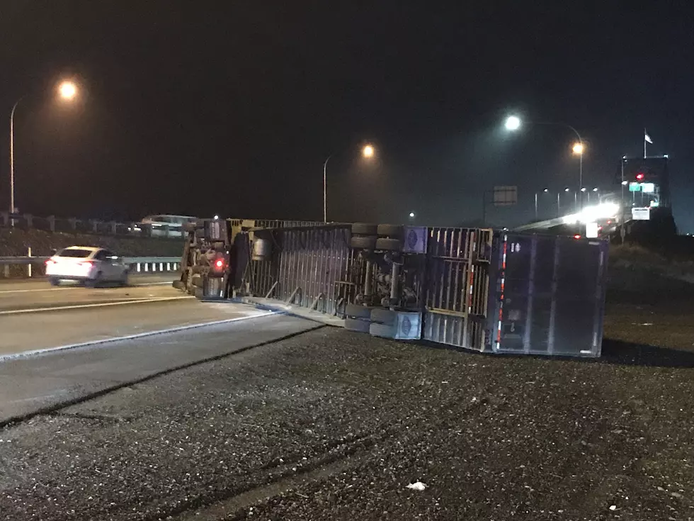 Semi-truck rollover causes delays on Highways 395 and 240