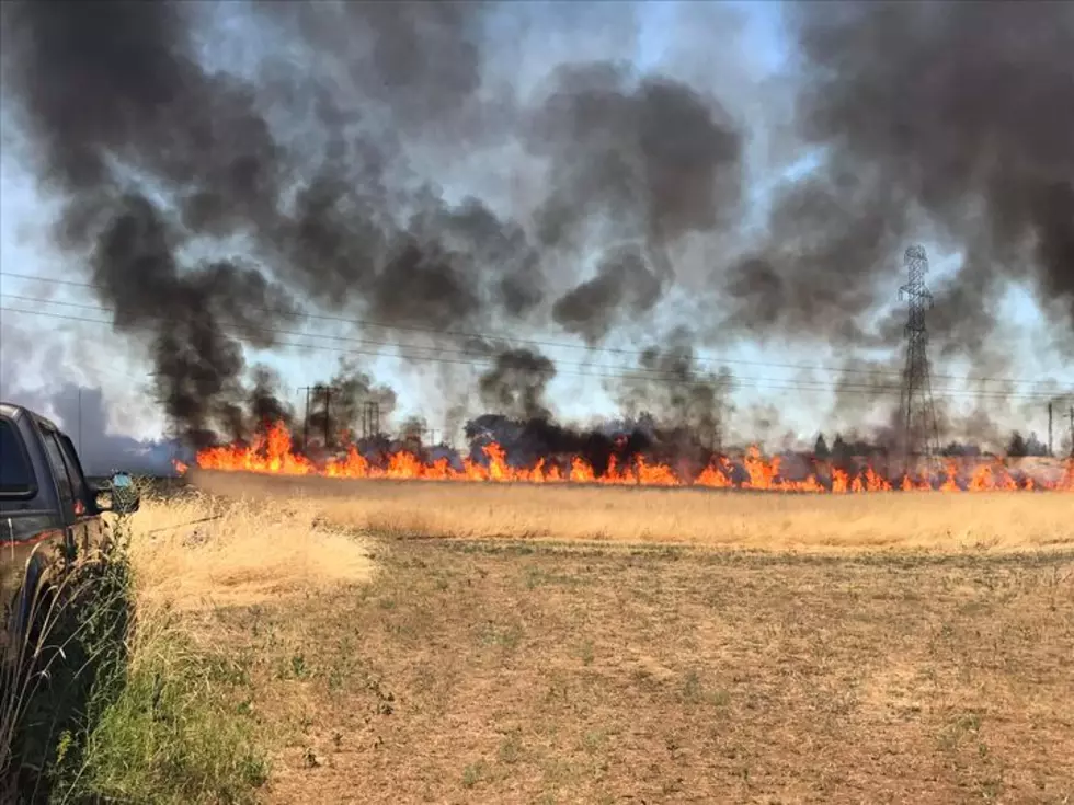 Brush Fire Threatens Power Lines in Finley