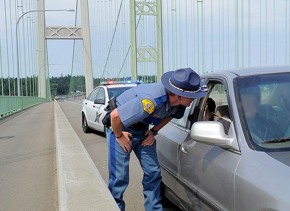 Why Does Law Enforcement in WA Tap the Back of Your Car?