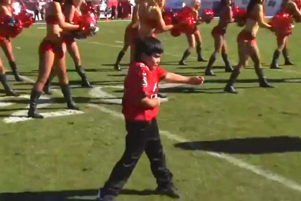 Adorable 7 Year Old Boy Dances With the Tampa Bay Cheerleaders Like a Pro