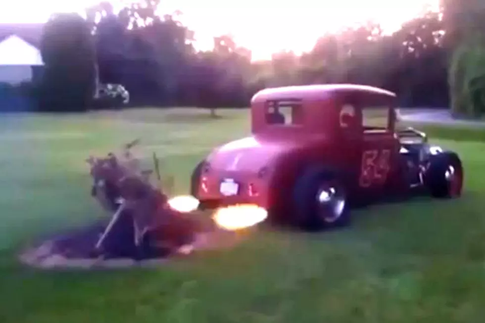 Watch a Flame Throwing Hot Rod Car Ignite a Bonfire