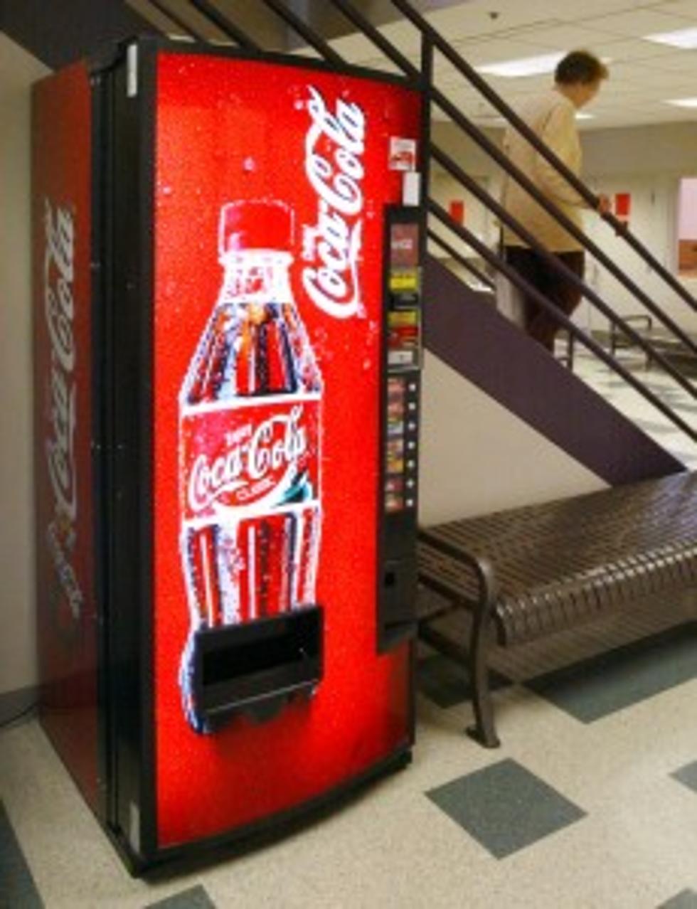 Police Say Man Was Touching Self by Soda Machine
