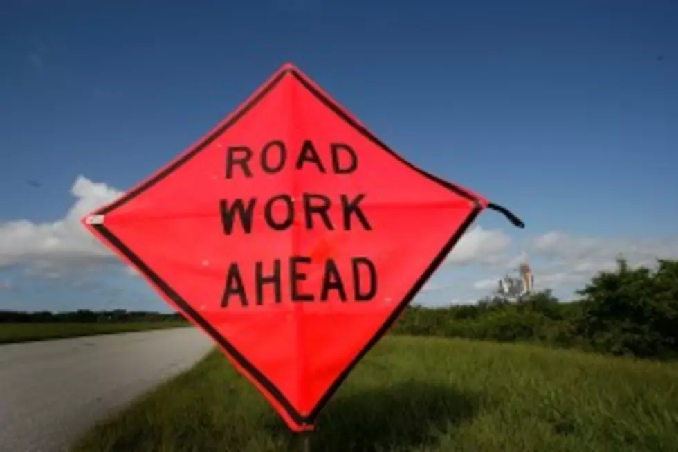 Sign Post Up Ahead&#8230;.Road Work!
