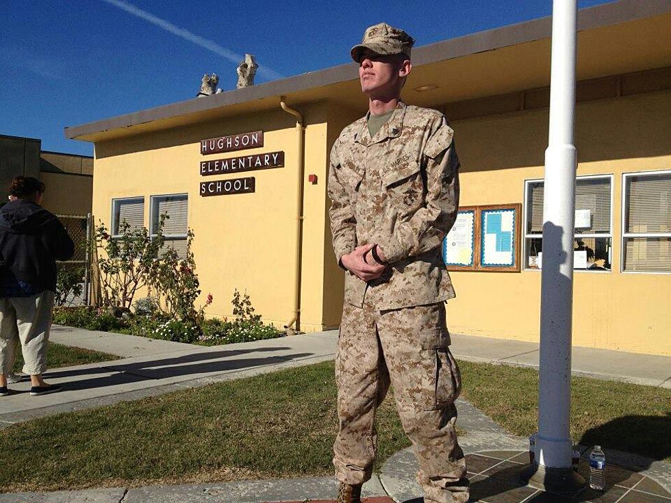 Marines Standing Guard At Schools