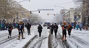 Bobcat Fans Brave the Snow For The Homecoming Parade