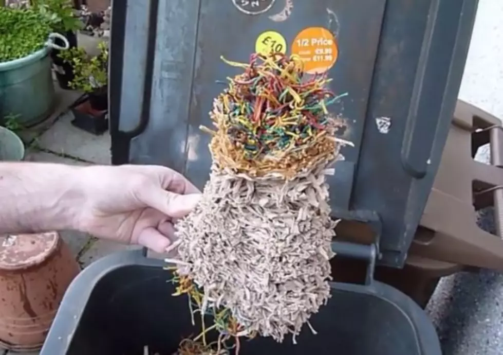 What Happens When You Cut a Really Big, Really Old Rubber Band Ball in Half? [VIDEO]