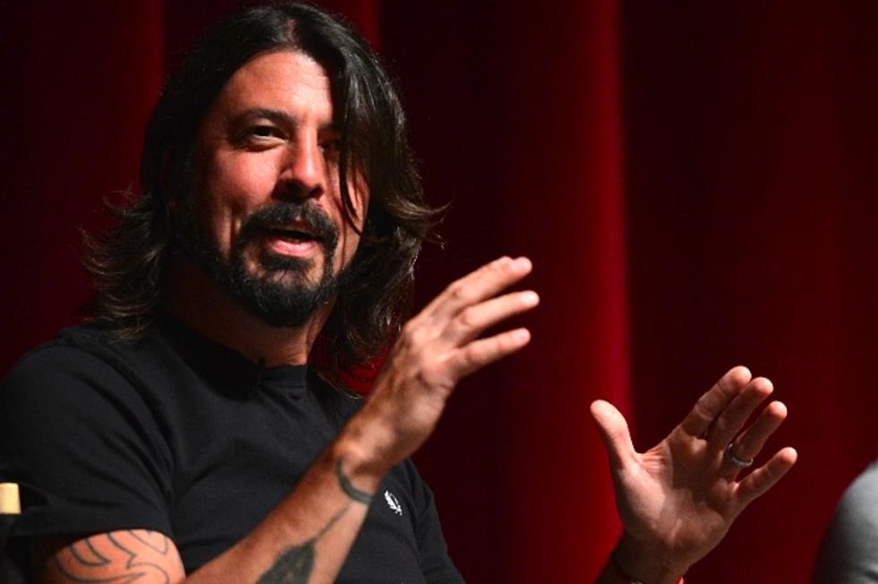 Foo Fighters’ Dave Grohl Honored With 900-Pound Drumsticks