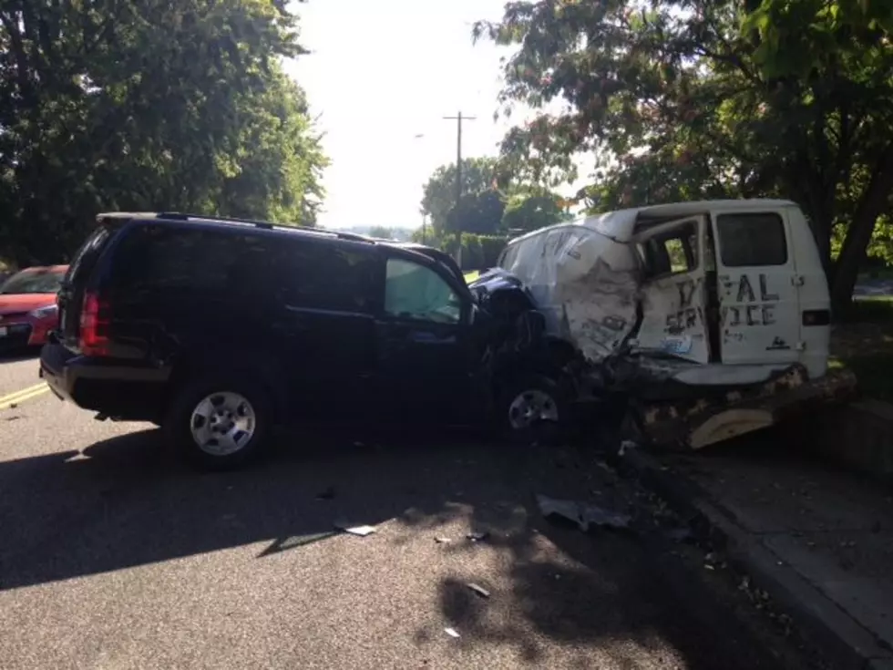 SUV Slams Into Parked Van, Then Car-One Injured