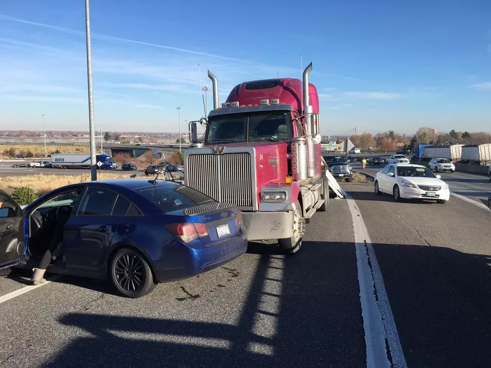 Traffic Slowed After Woman Allegedly Fails to Pass Semi