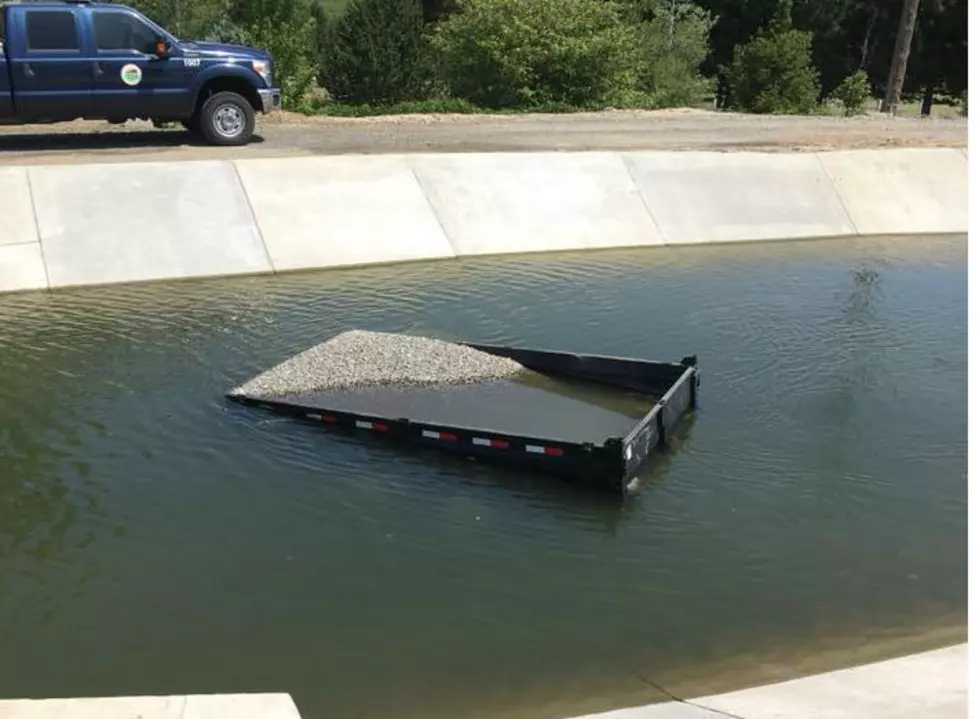 Big Gravel Trailer Goes for Swim in Kennewick Canal