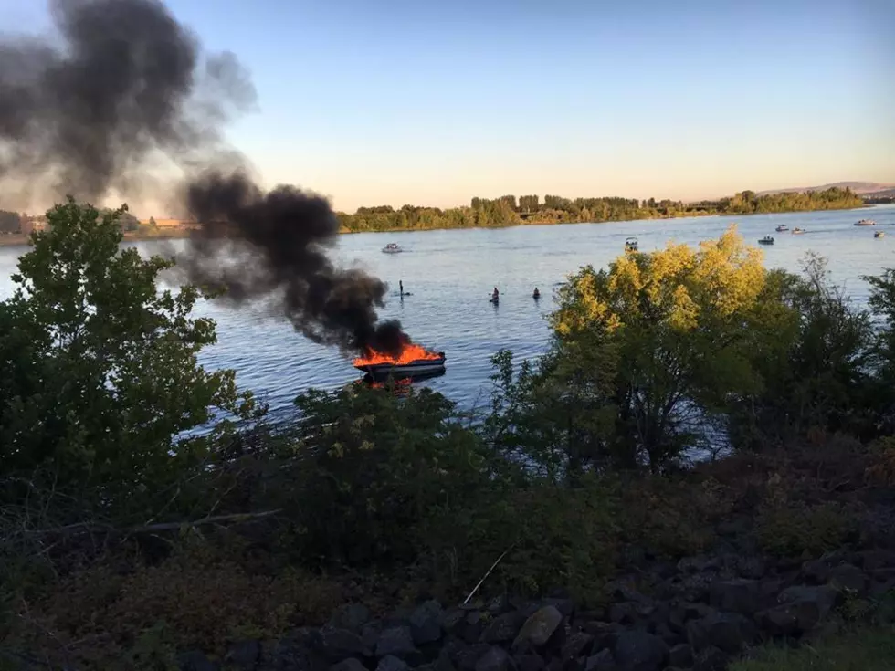 Jet Skier Sprays Flaming Boat with Rooster Tail, Helps Save Driver