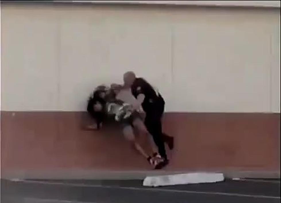 Cop Body Checks Girl Into Wall [VIDEO]