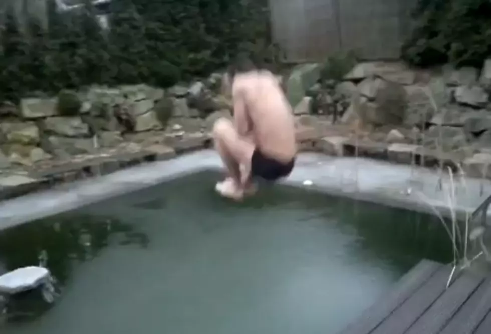 Man Jumps Into Frozen Swimming Pool With Expected Results [VIDEO]