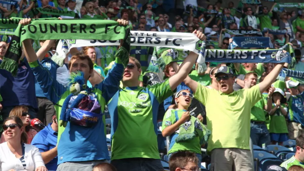 A Seattle Soccer Fan Freaks Out at a Guy for Standing During a Game
