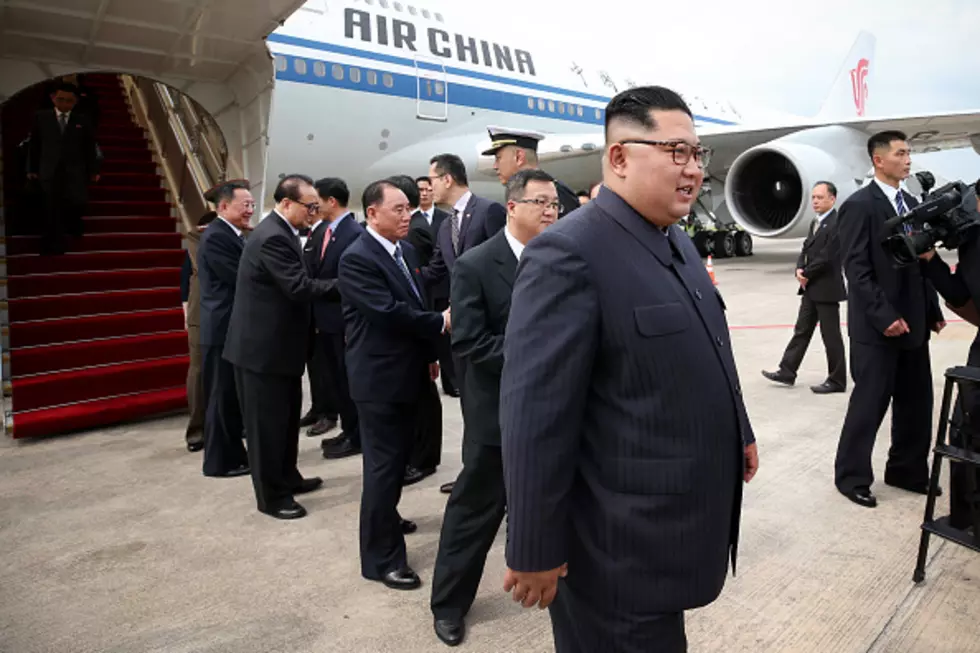 Watch Kim Jong Un’s Security Run Alongside His Limo In Singapore