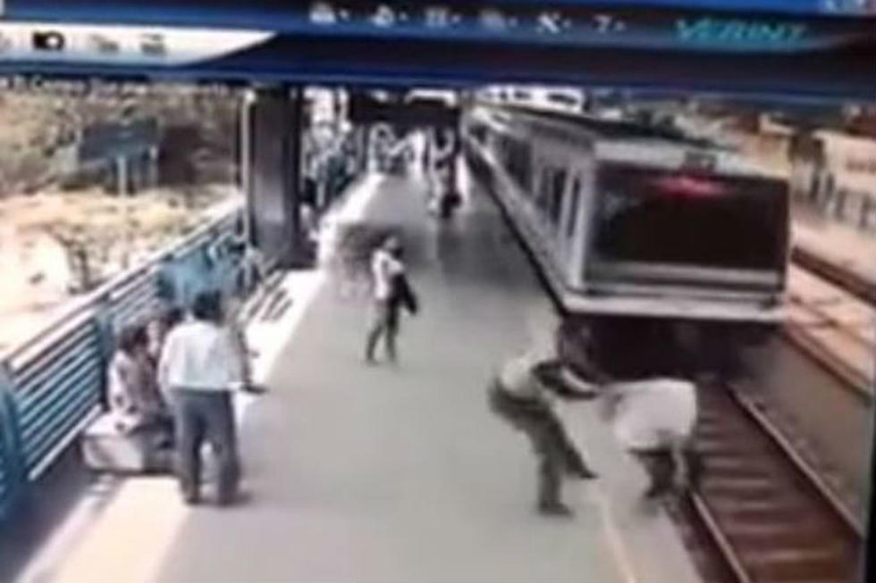 Suicidal Man Jumps in Front of Train; Officer Pulls Him to Safety Just in Time