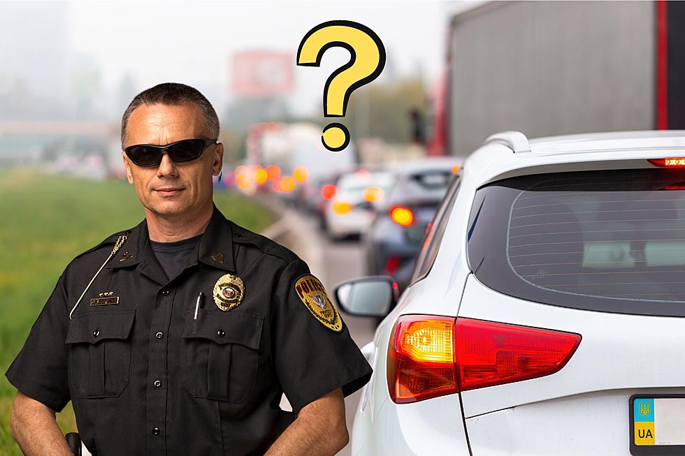 Why Do Cops Touch The Back Of Your Car During A Traffic Stop?