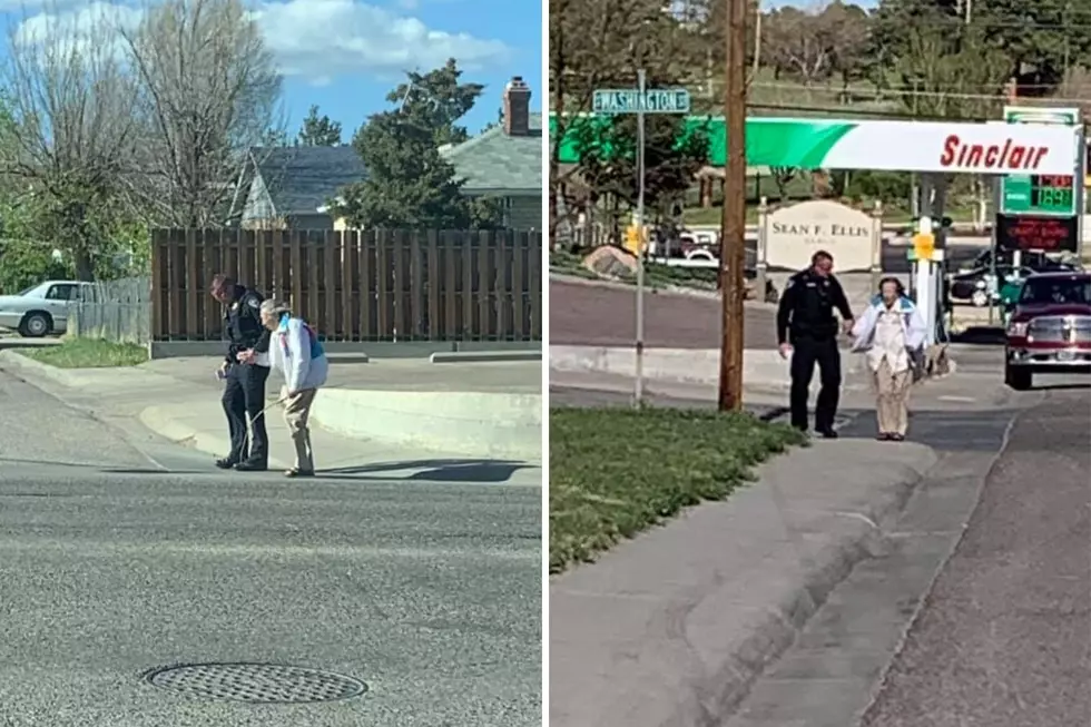 Casper Police Officer Helps Older Lady Cross The Street