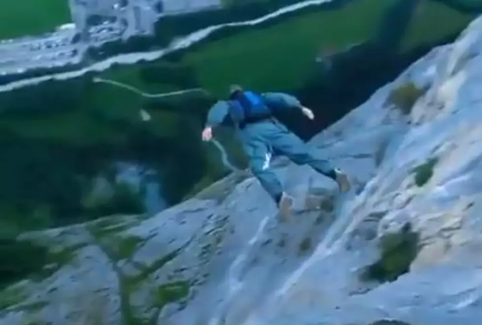 Check Out This Guy Parachuting Off A Mountain Cliff