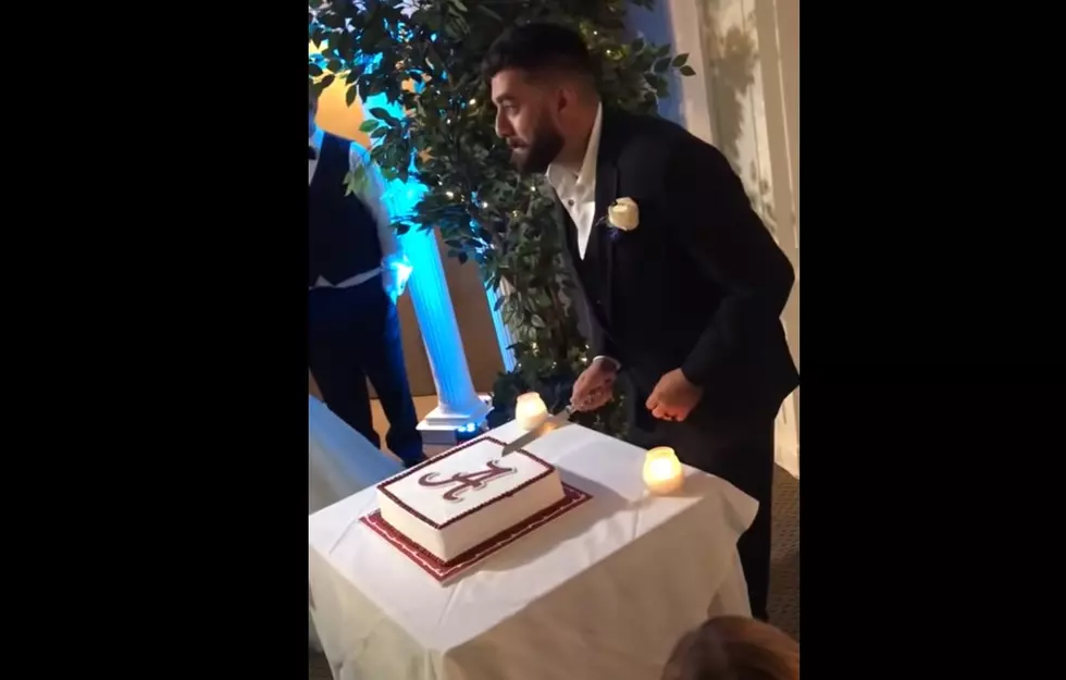 Alabama Fan Gets Trolled by his LSU Wife While Cutting the Cake