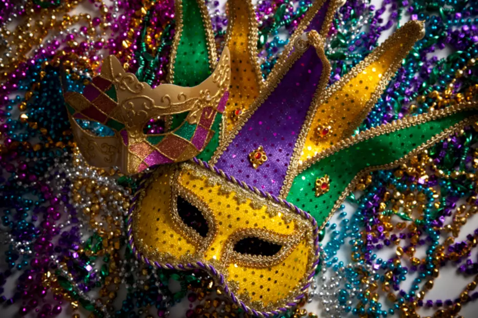 South Alabama Trolls New Orleans, Louisiana With Mardi Gras Themed Helmets against Tulane