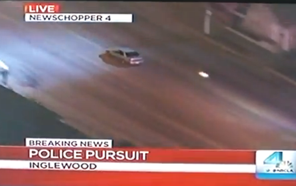 Guy Records Police Chase On TV, Chase Speeds By His House [VIDEO]