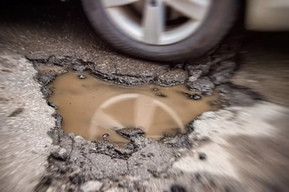 Governor Walz Asked Minnesotans To Share #MNPotholes Photos – Here Are Some Of The Worst